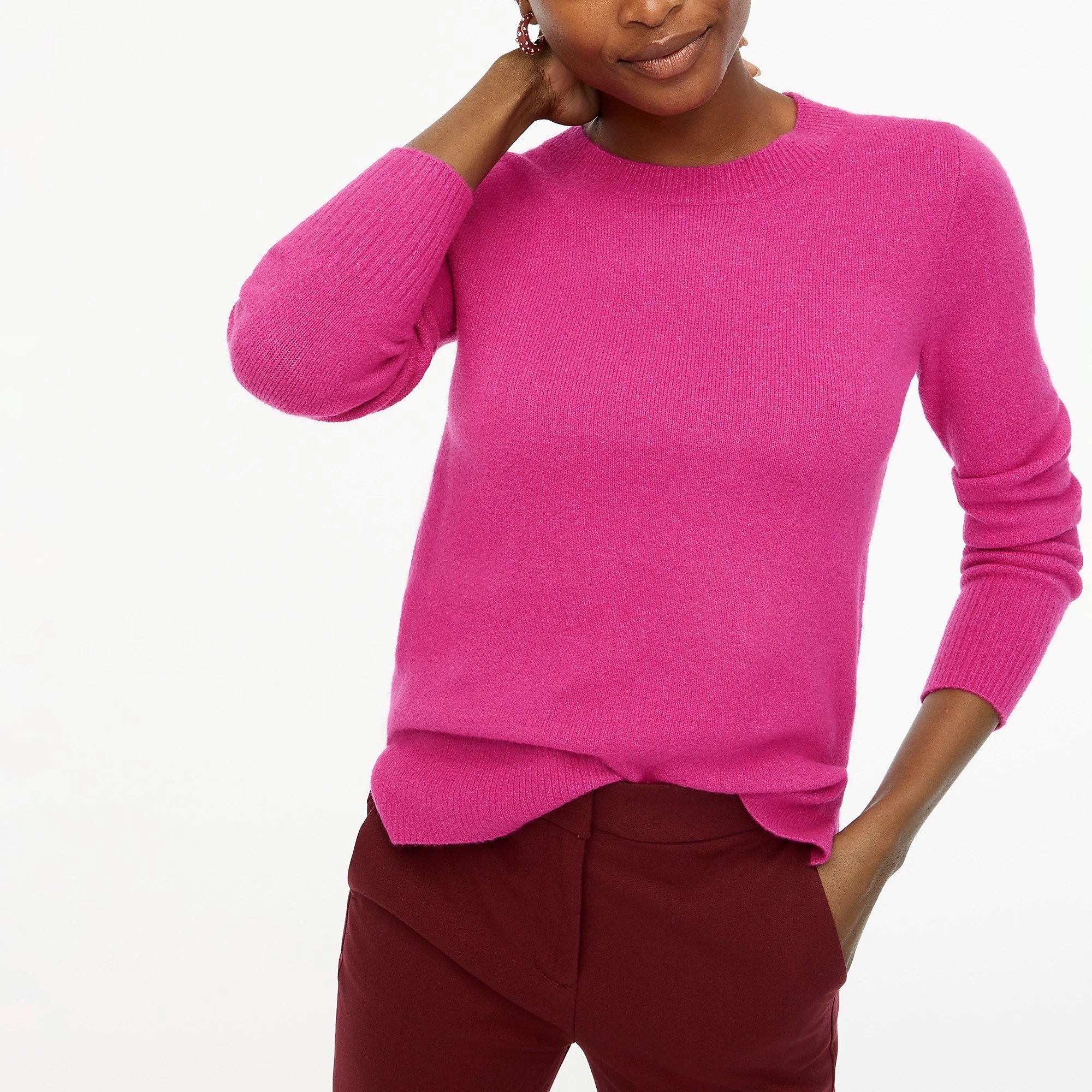 model in hot pink crewneck sweater