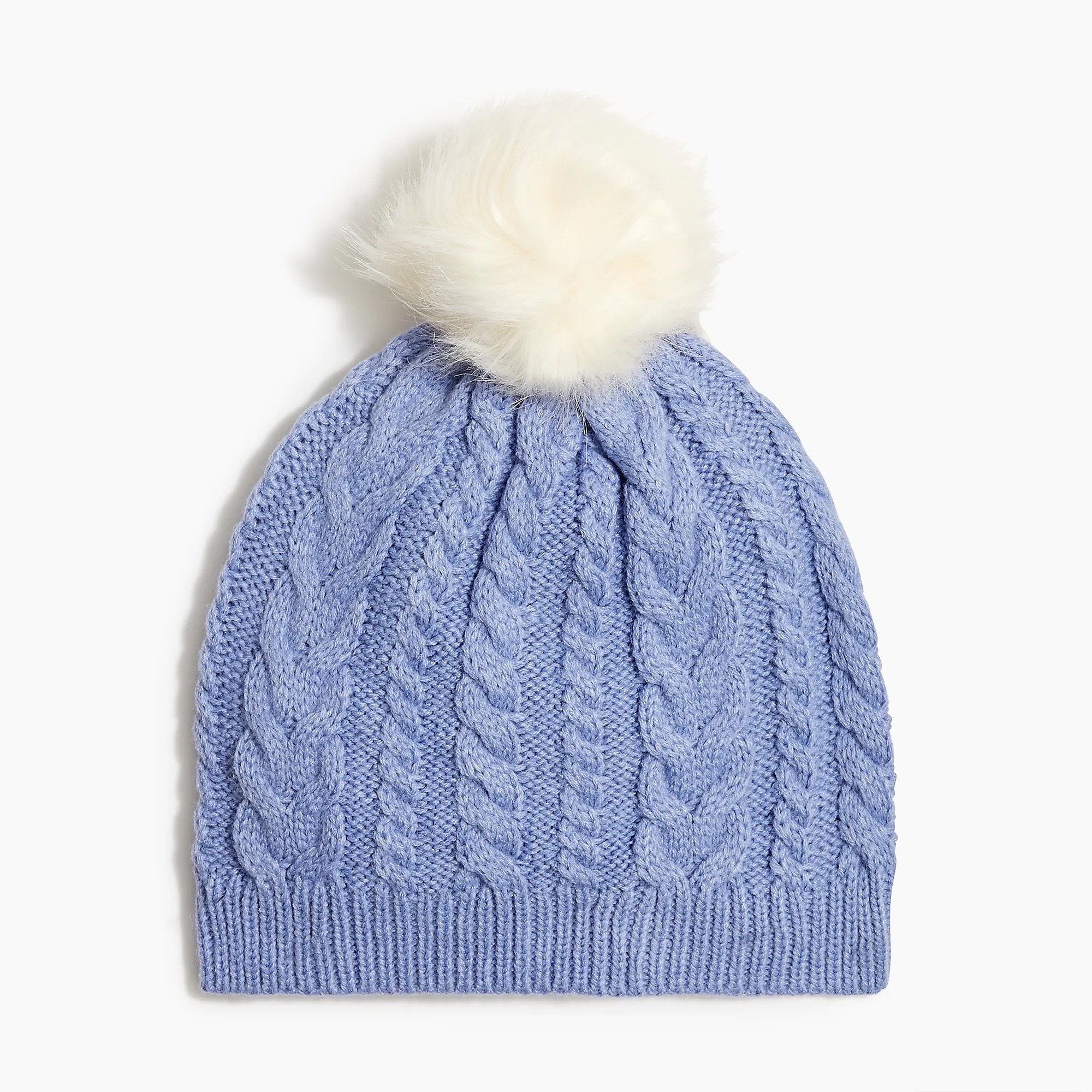 light blue cabled knit beanie with white faux fur pompom