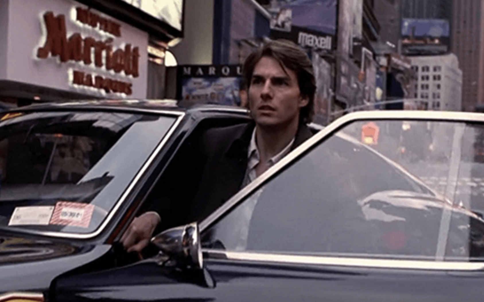 tom cruise getting out of a car