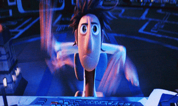 flint from cloudy with a chance of meatballs typing away at a computer