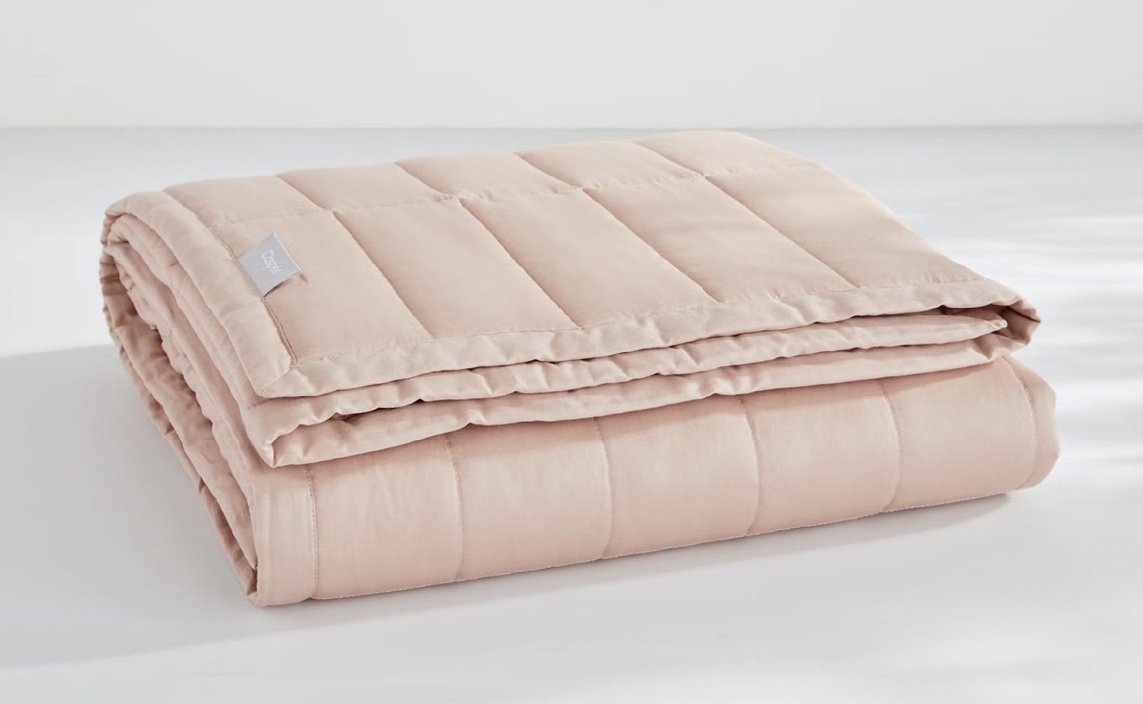 the weighted blanket in dusty rose