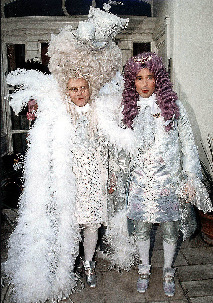 Elton John and David Furnish in costume