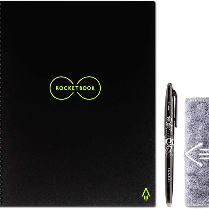 The notebook, pen, and microfiber cloth