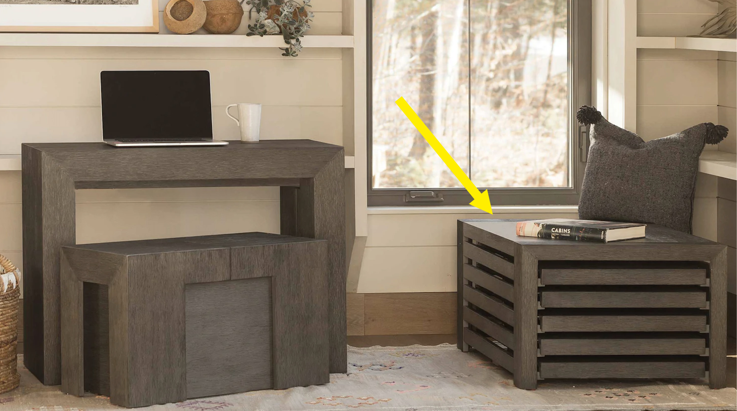 the coffee table on the right with panels being removed as the table gets extended