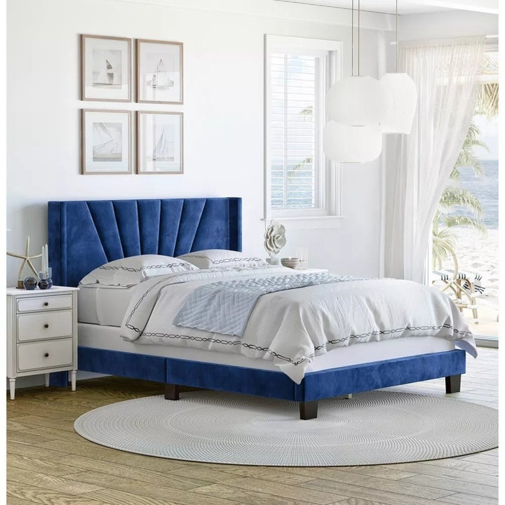 a blue velvet bed frame