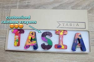 customized rainbow crayons that spell out "tasia"