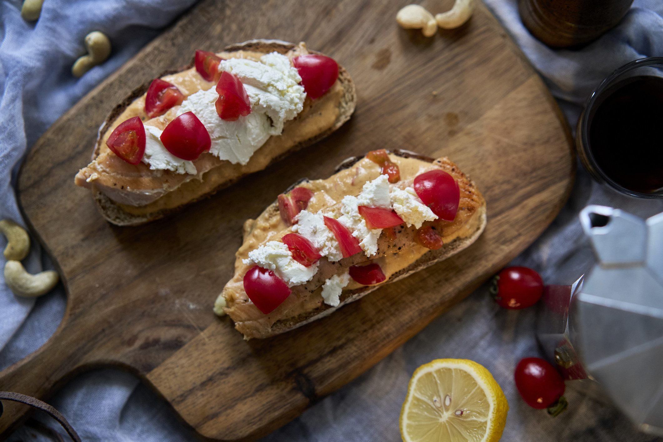 Breakfast toast with peanut butter and tomatoes.
