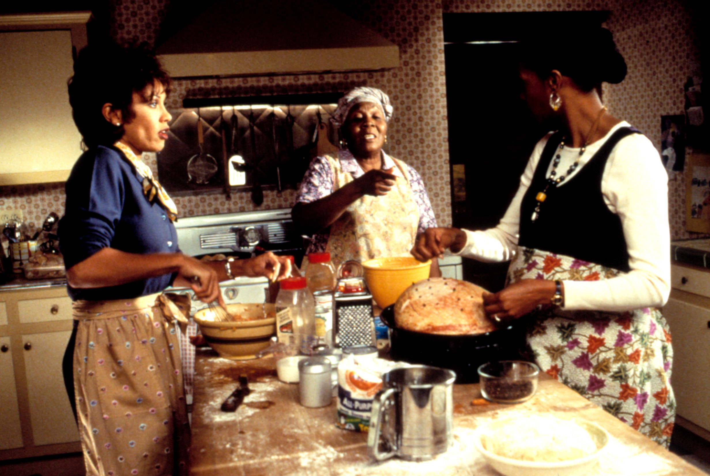 Vanessa L. Williams, Irma P. Hall, and Vivica A. Fox cook in a kitchen