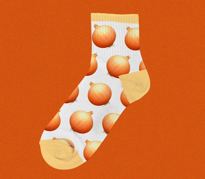 A white sock with an emoji onion pattern