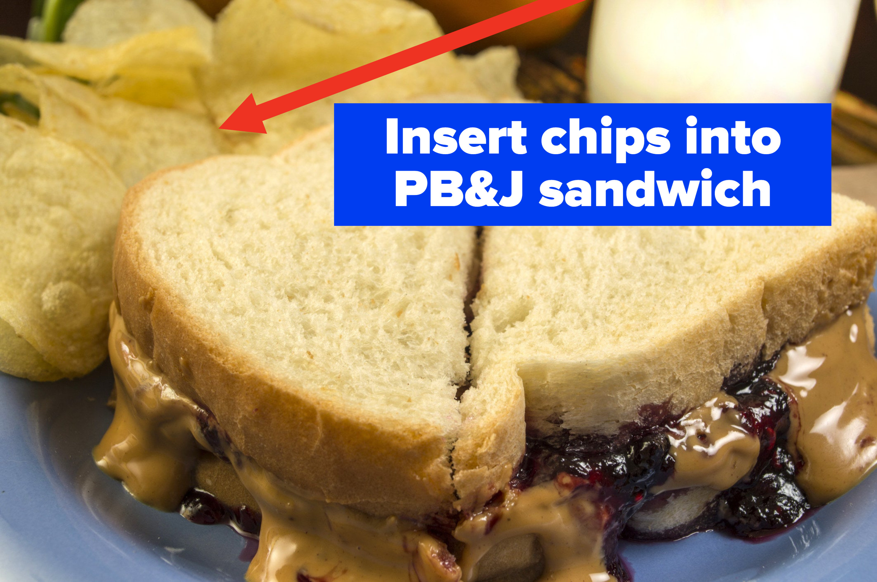 Peanut butter and jelly sandwich on a plate.
