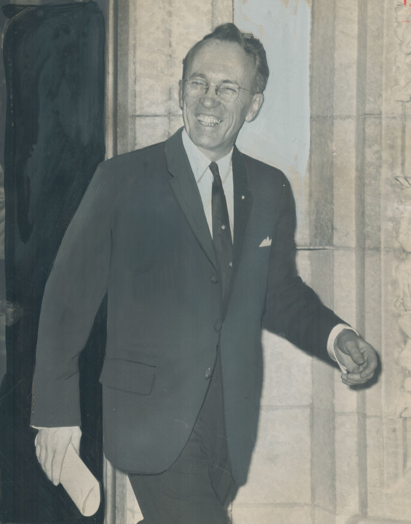Black and white photo of Tommy Douglas walking