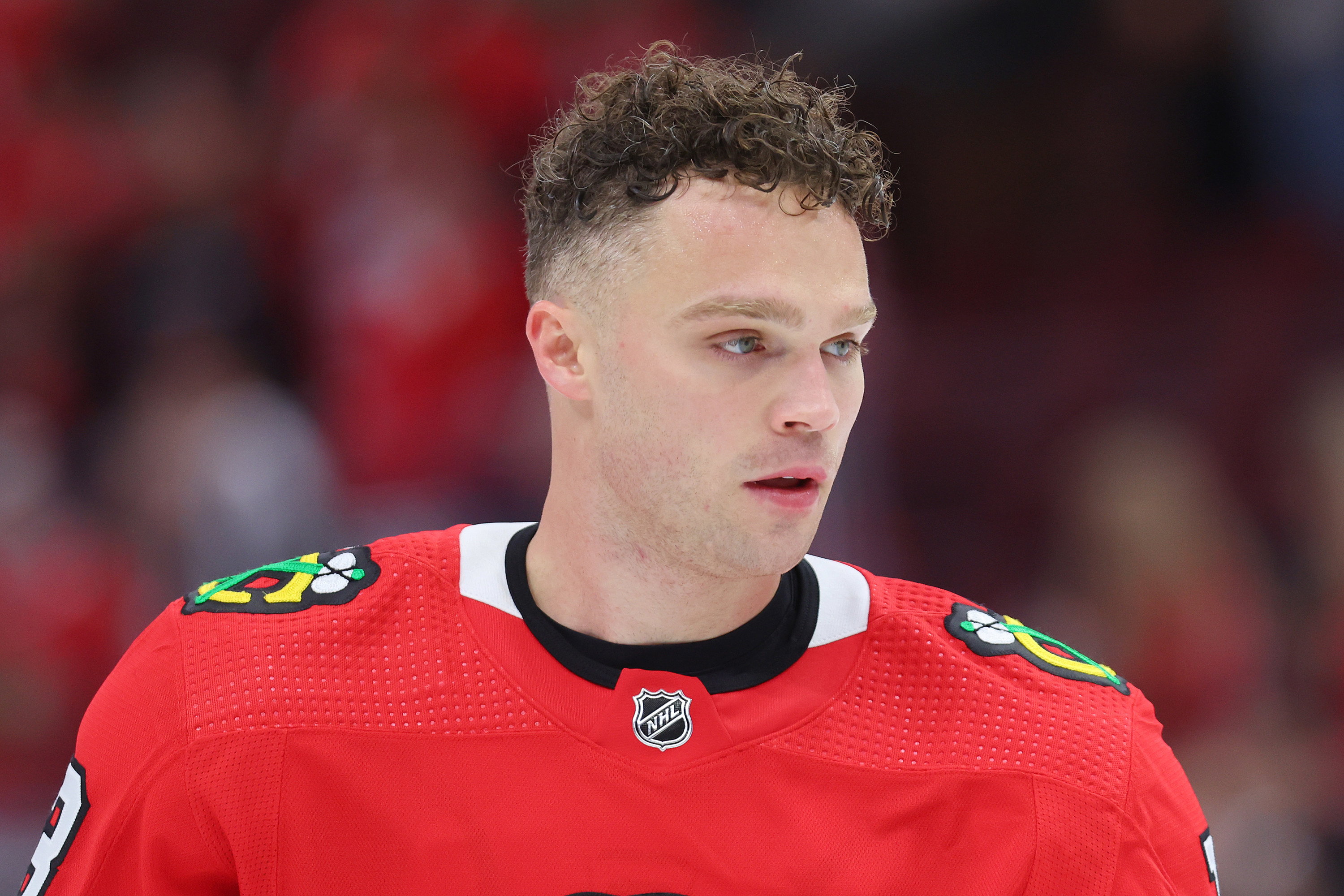 Max Domi #13 of the Chicago Blackhawks looks on prior to the game against the Detroit Red Wings at United Center