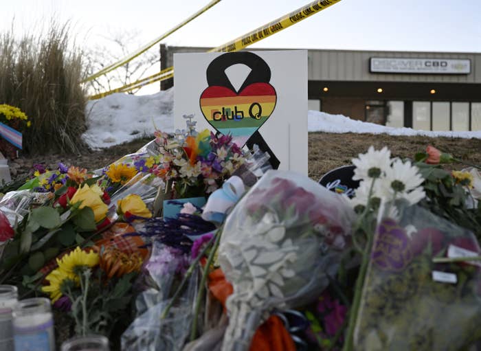 Flowers piled up outside Club Q.