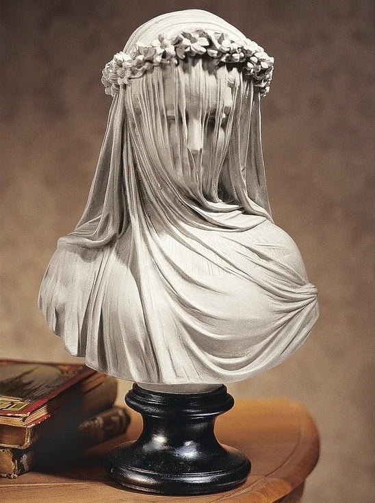 a bust of the veiled lady