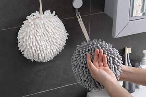 a container of everything bagel seasoning and the seasoning being sprinkled onto a bagel