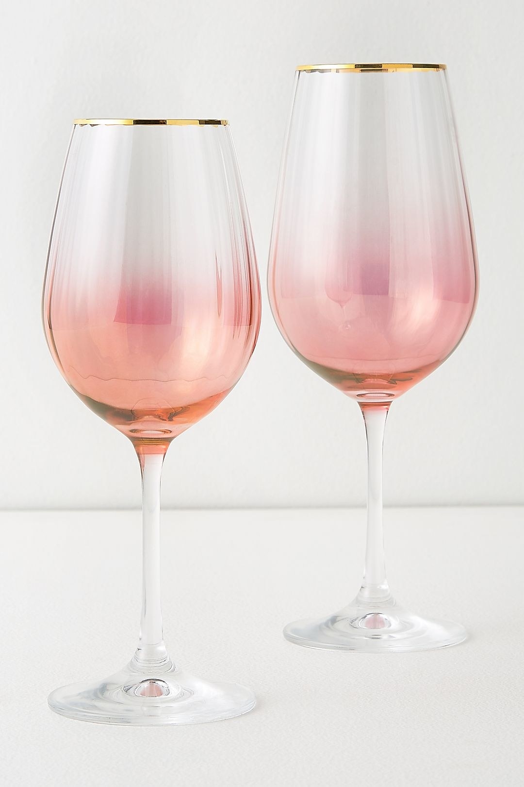 wine glasses with ombre pink in the bottom of the glass