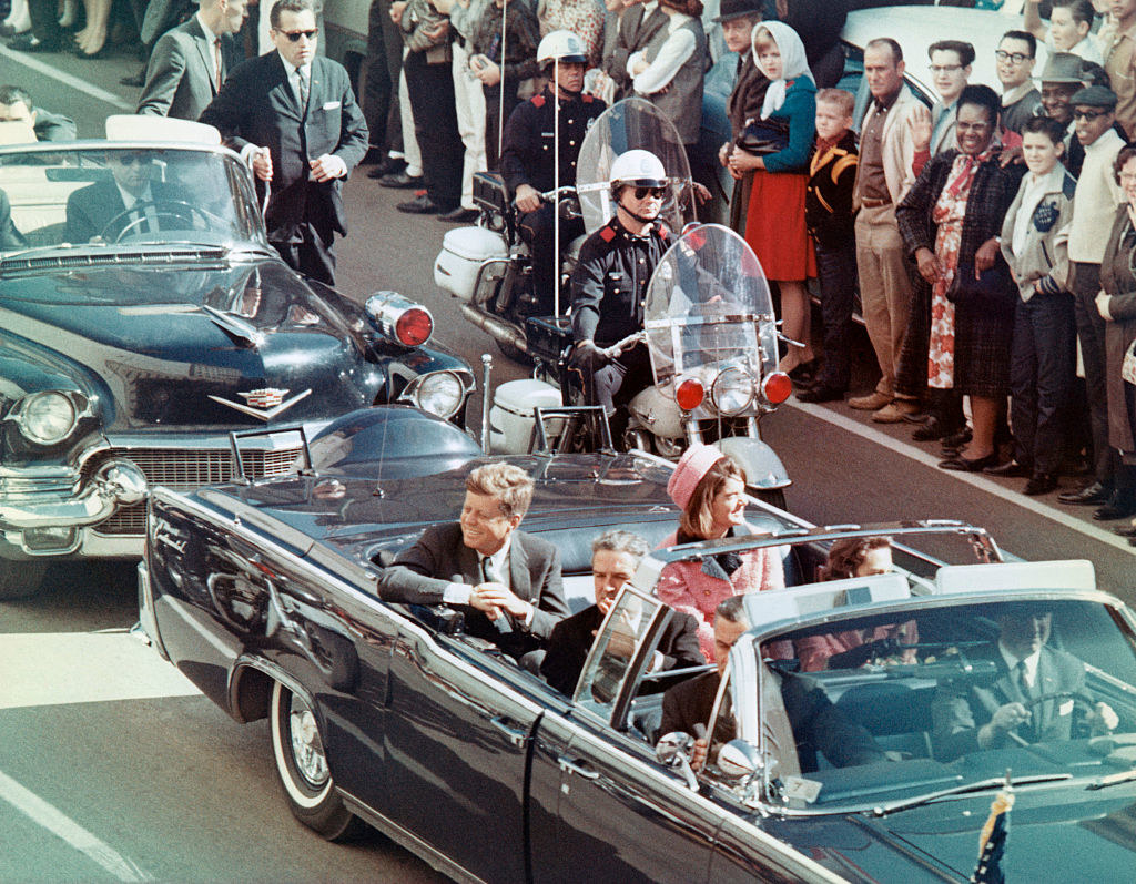 John and Jackie Kennedy in the convertible car