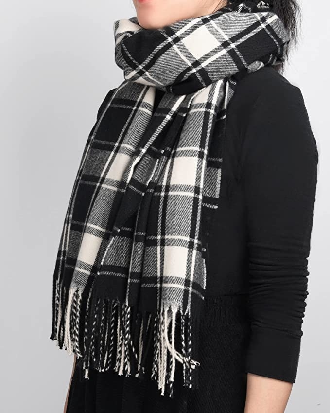 model wearing a black and white checkered scarf