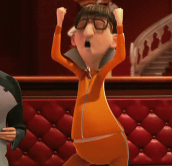a gif of a character from despicable me doing an aggressive happy dance