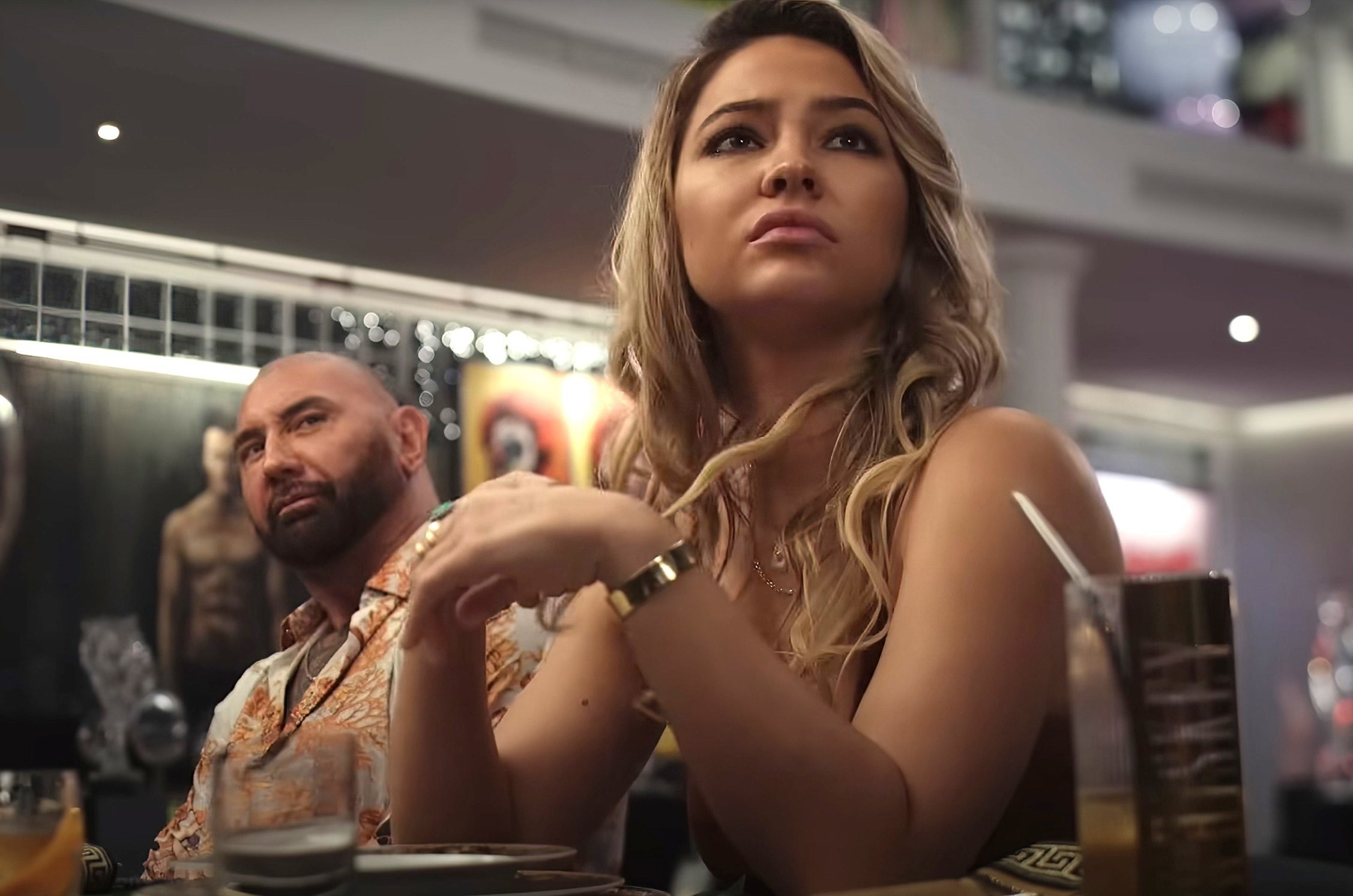 Dave Bautista and Madelyn Cline in Glass Onion: A Knives Out Mystery