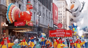 a more recent parade with a turkey balloon as well as a snowman balloon