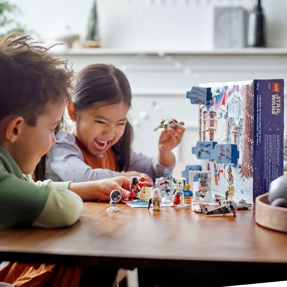 kids playing with the lego set
