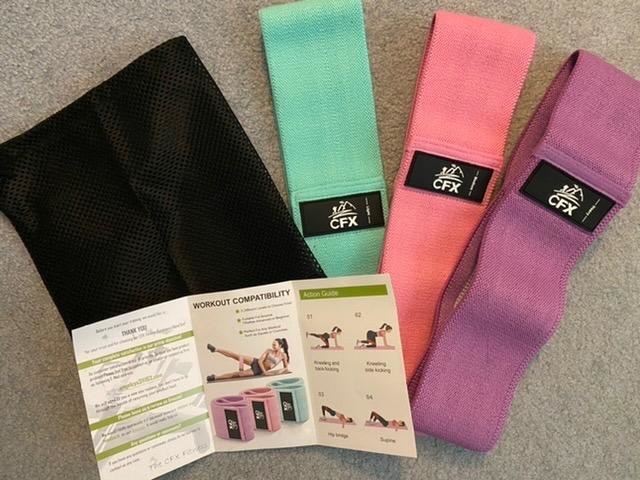 Reviewer image of three resistance bands, bag and instructions