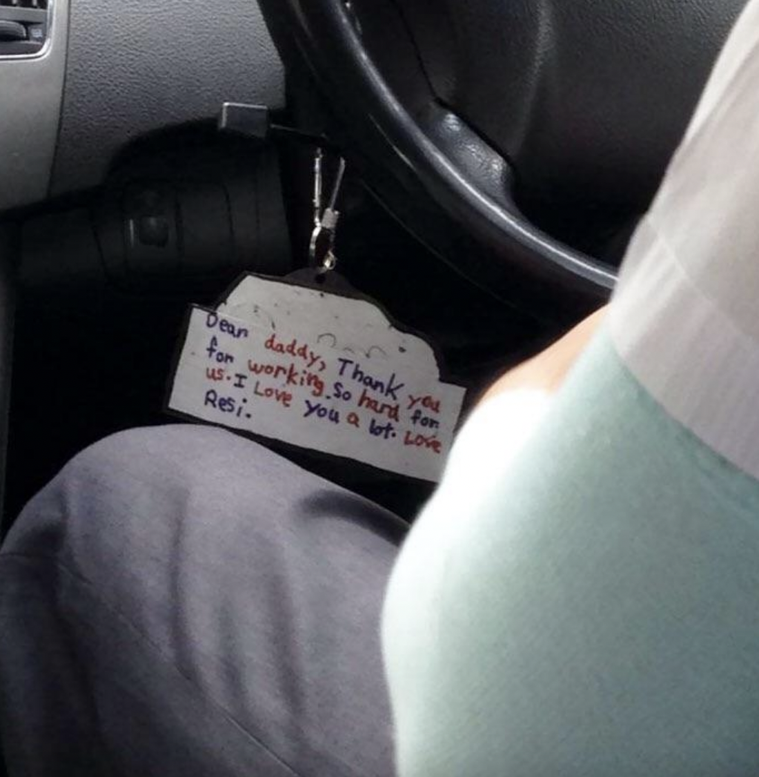 the note on the car keychain