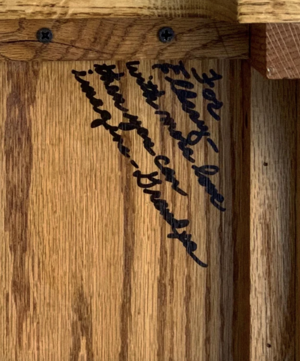 writing on the wood drawer