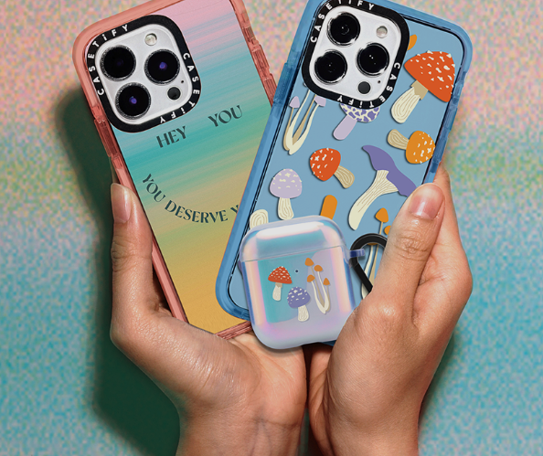 Two phones held side-by-side to show phone cases.