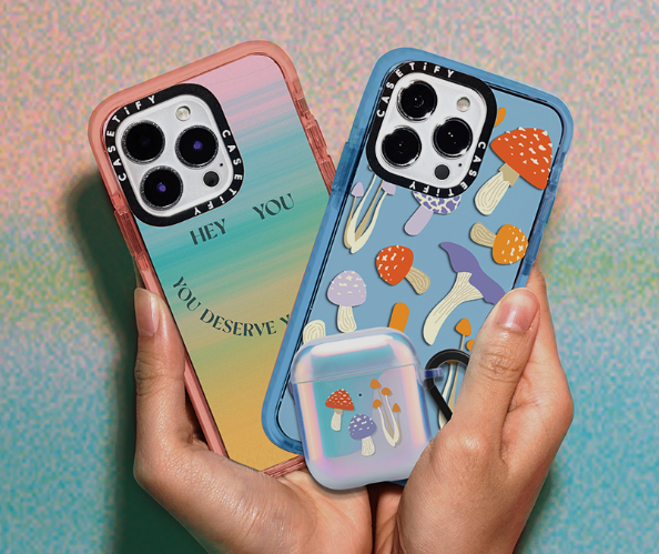 Two phones held side-by-side to show phone cases.