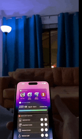 GIF of reviewer using Siri to open curtains