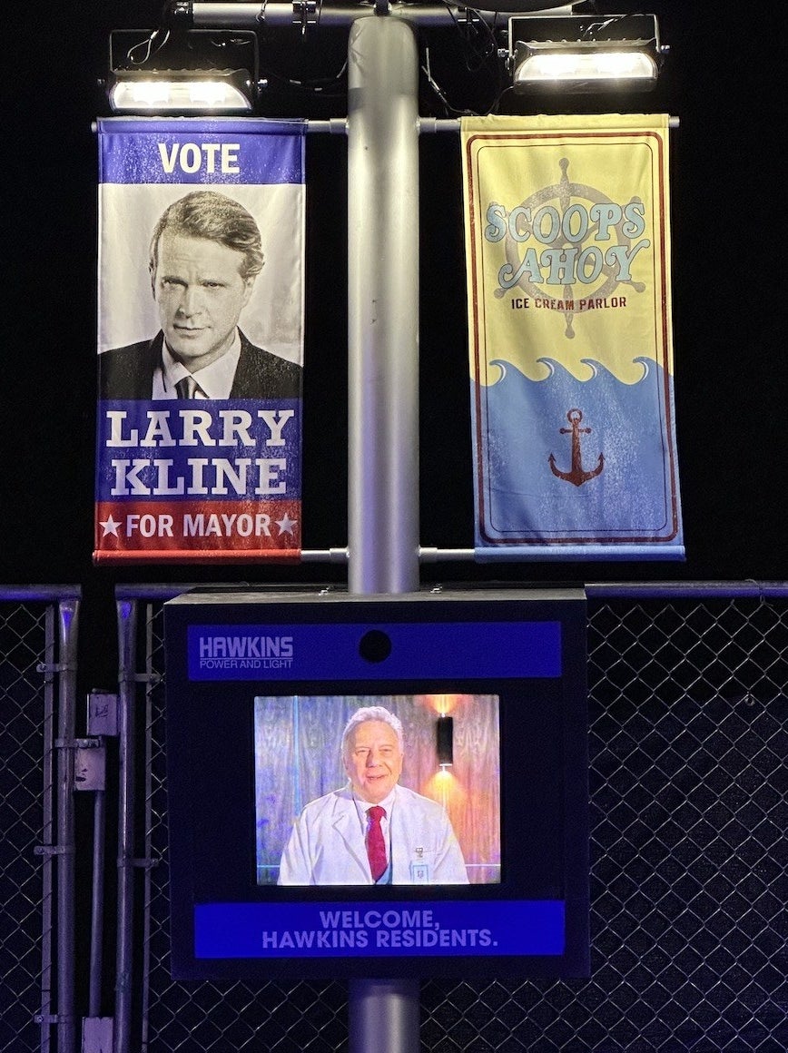 Larry Kline for Mayor sign and welcome Hawkins Residents greeting from doctor