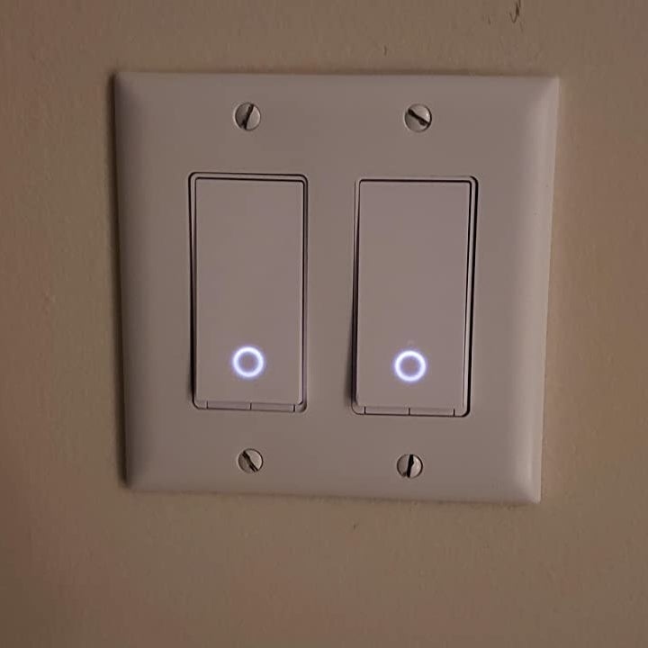reviewer's photo of newly installed light switches