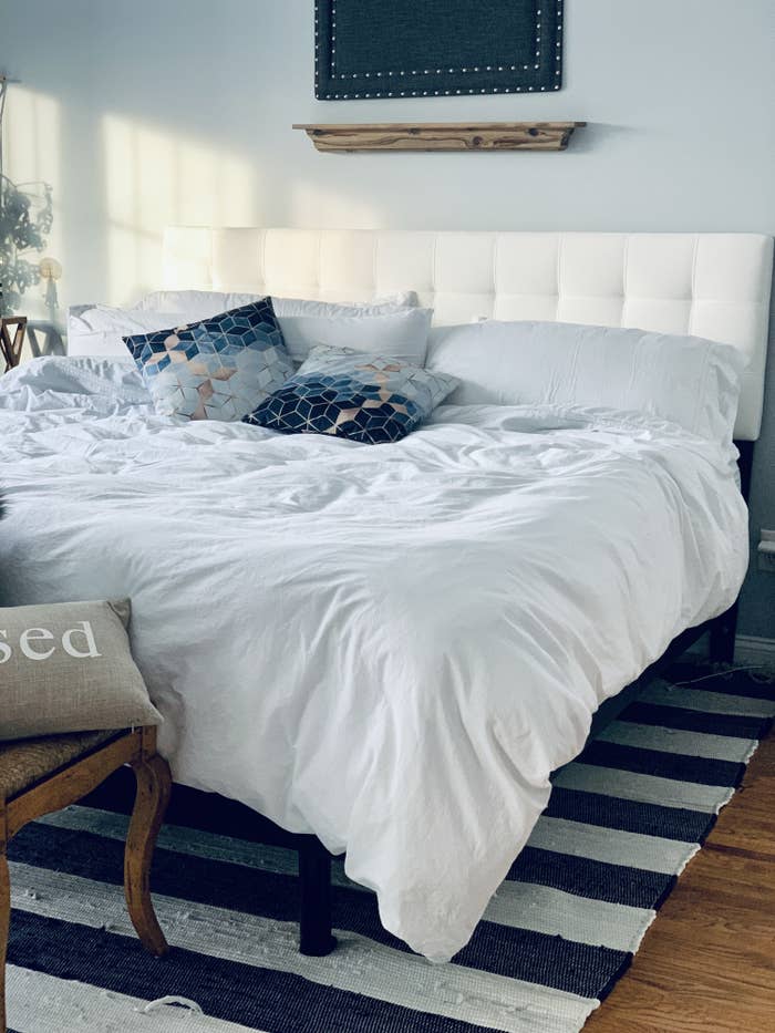 the white duvet on a reviewer's bed