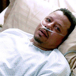 Terrence Howard lying on a bed with oxygen going into his nose