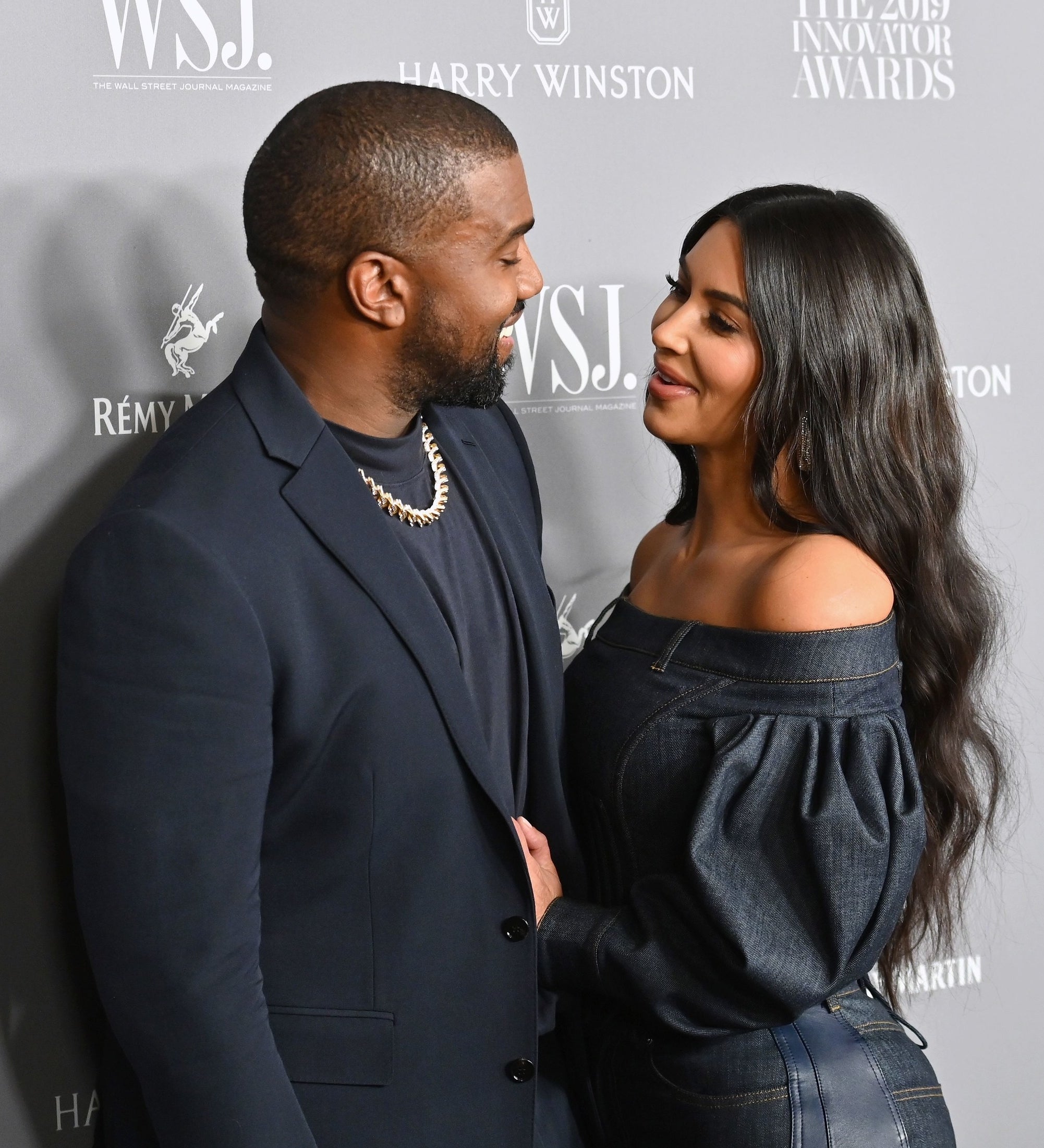 Ye and Kim smiling at each other