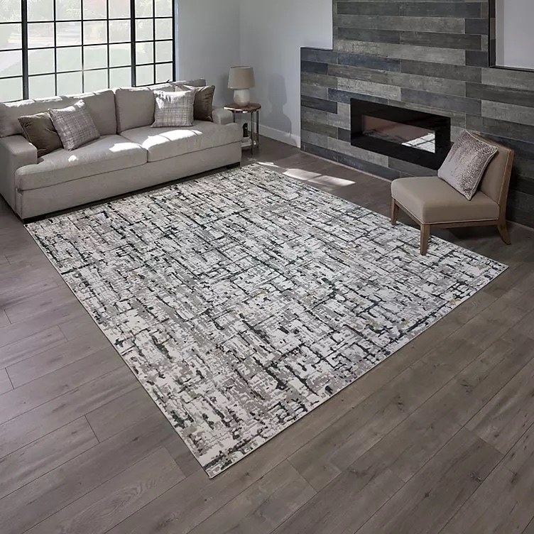 The area rug on the floor in a living room