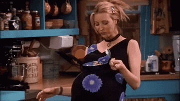 GIF of a pregnant Phoebe in &quot;Friends&quot;