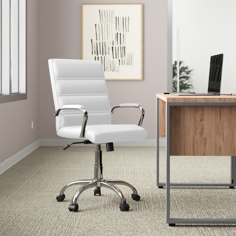 white faux leather rolling office chair with a slilver frame