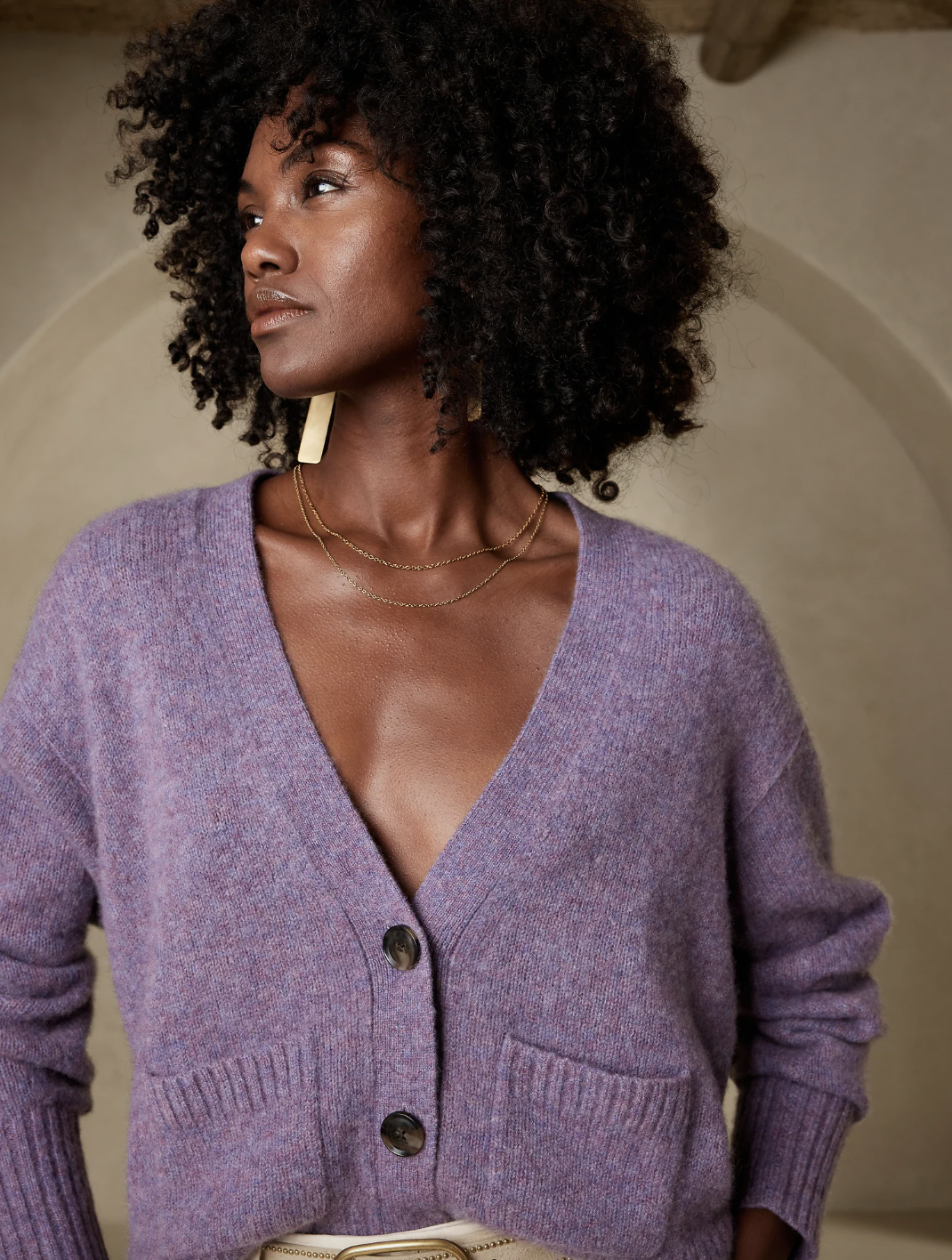 a person wearing the plush cashmere cardigan