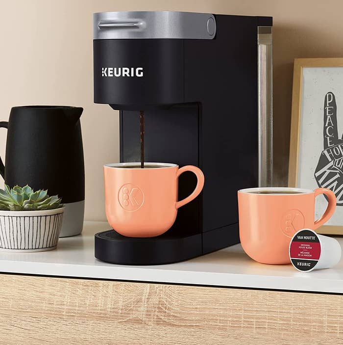 a slim keurig coffee maker on a counter