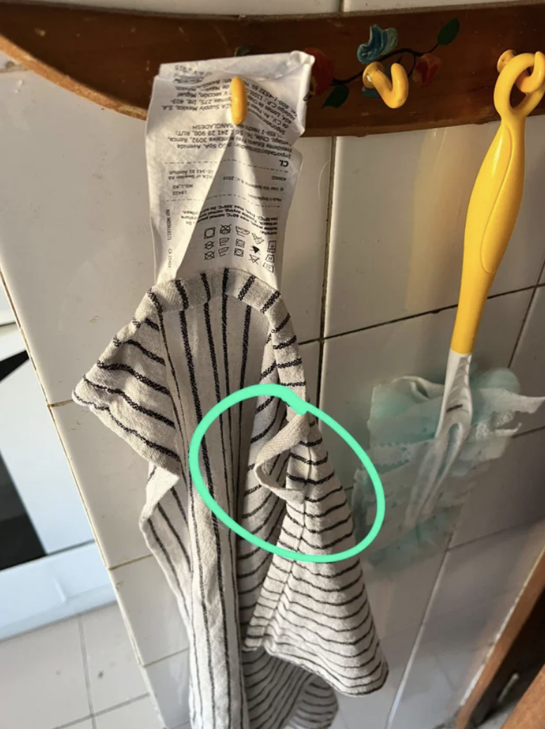 A towel hanging by its tag