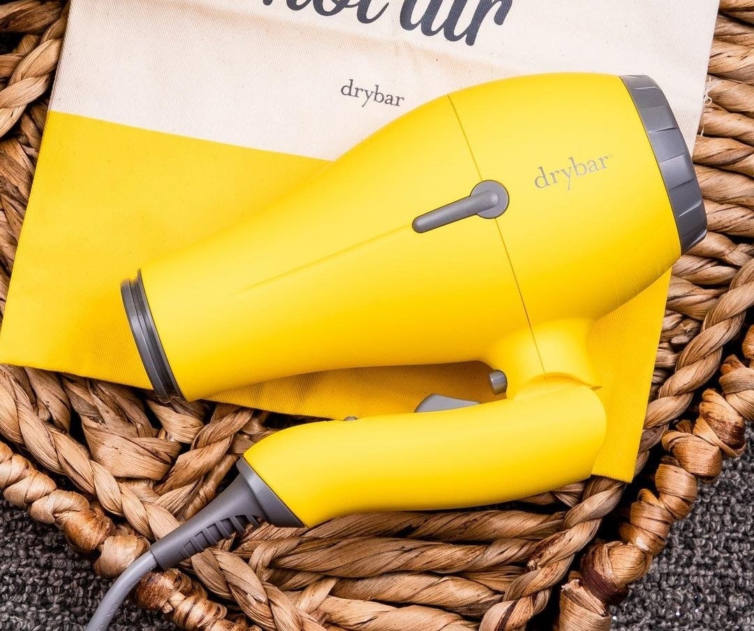 the folding hair dryer on a basket