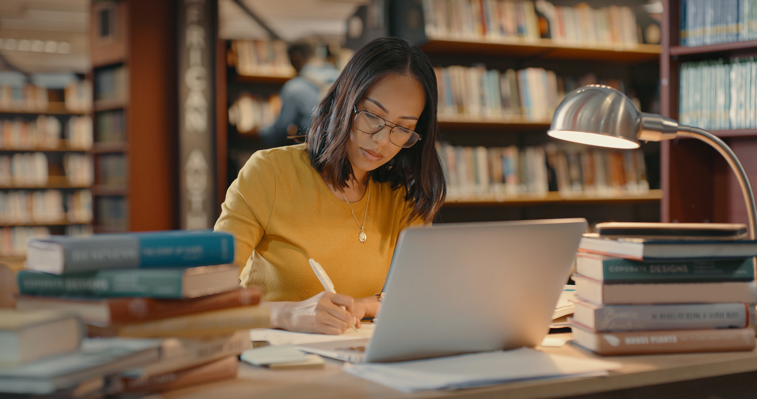 Young woman studying in the library