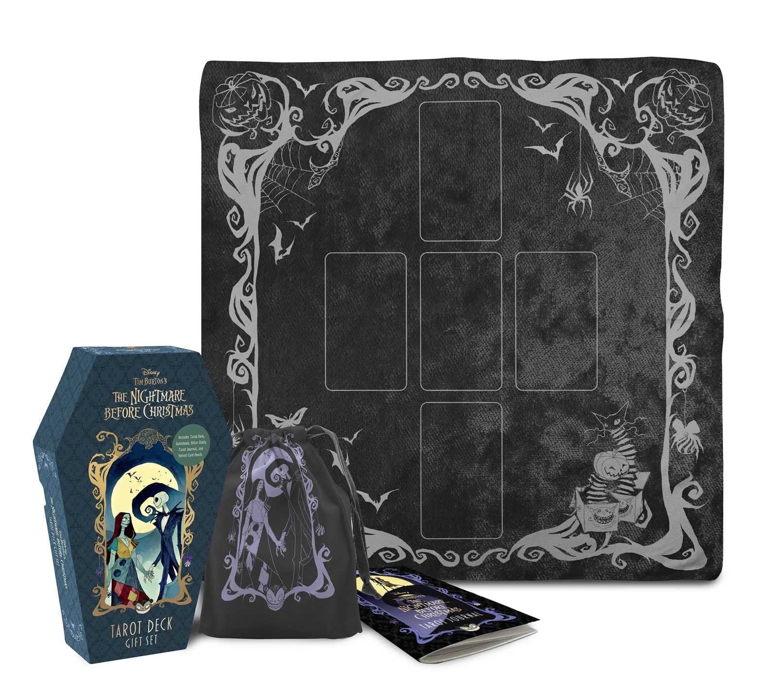 A tarot deck board that is black but has spooky designs along the edge and the box shaped like a casket