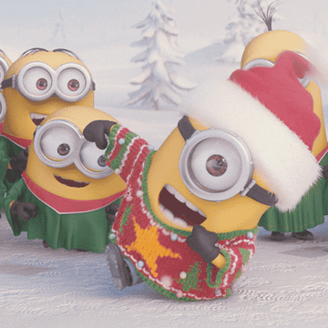 gif of minions dancing in Christmas outfits