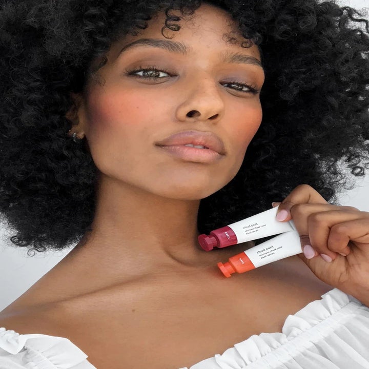 Model wearing cloud paint