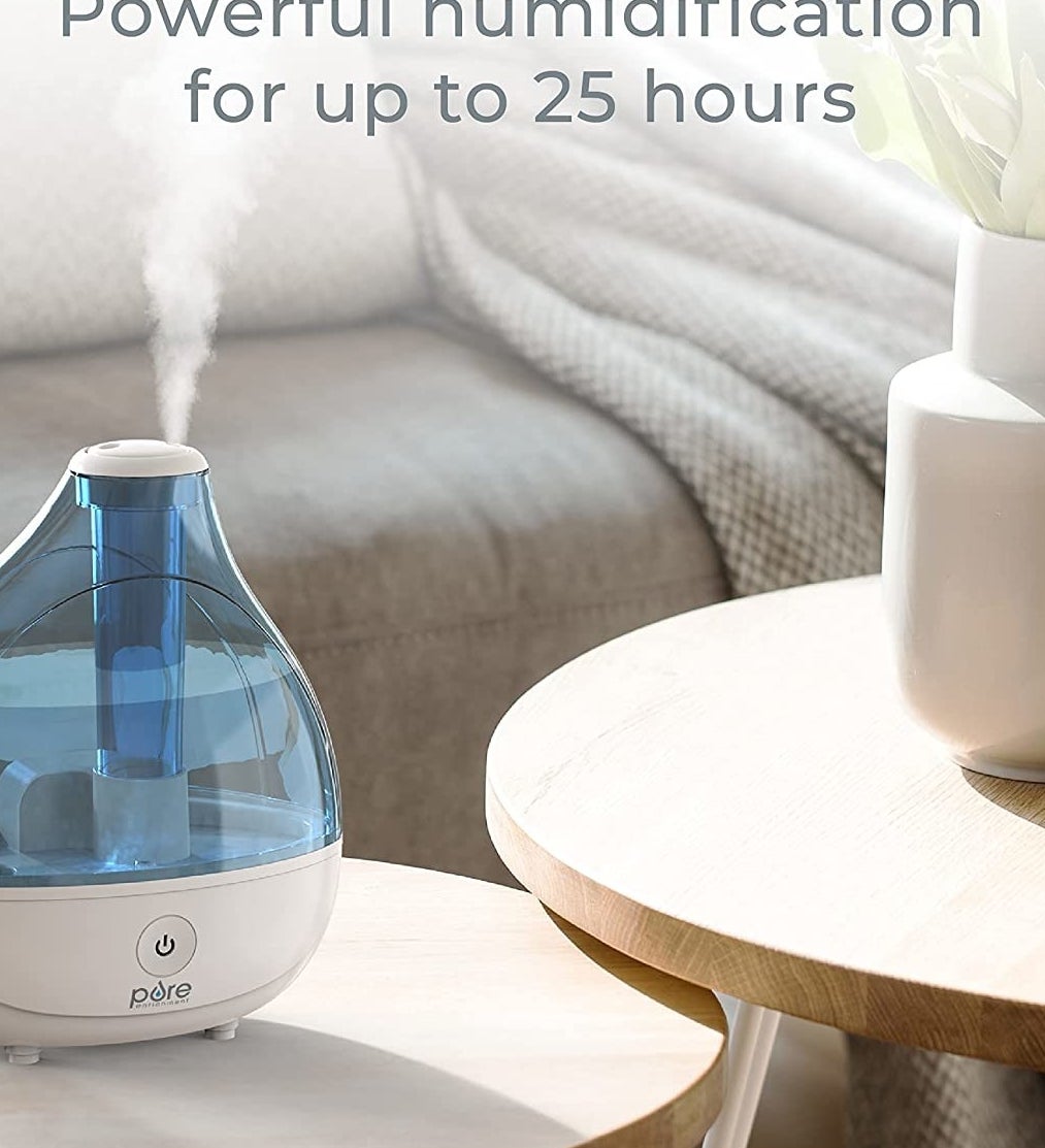 a humidifier in a living room on a low table