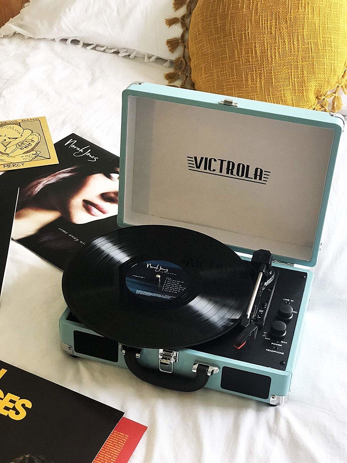 Reviewer photo of the blue record player with Norah Jones playing